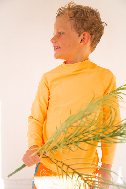 ORANGE BRITE RASH GUARD